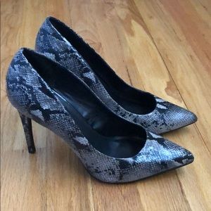 Express snakeskin pumps